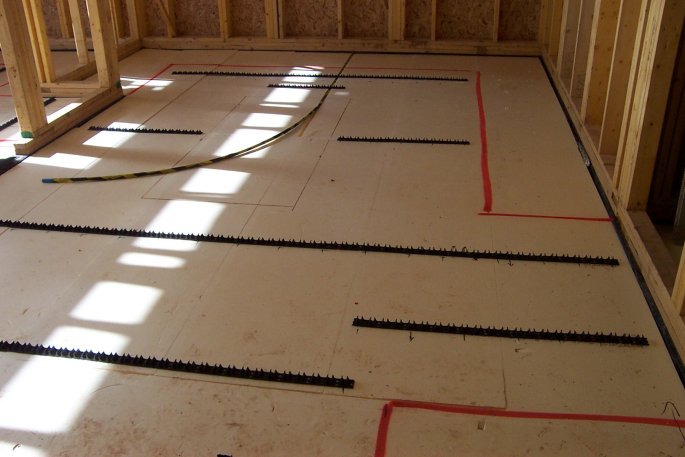 photo of insulation laid for underfloor heating in kitchen