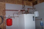 photo of ground source heat pump and plumbing