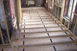 photo of underfloor heating in slab and screed floor prepared for hardwood flooring