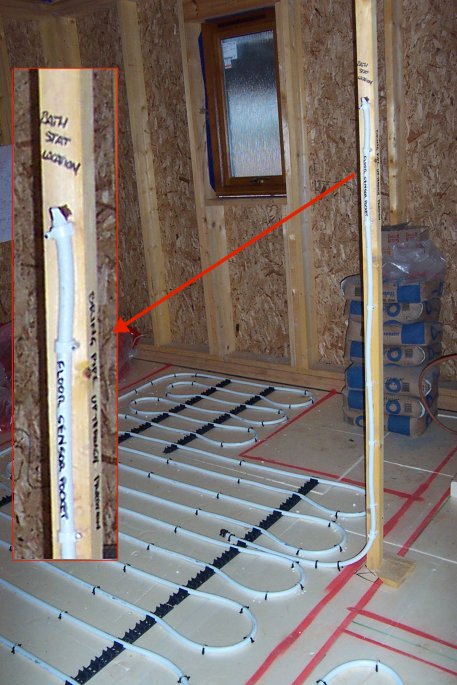 photo of underfloor heating with closup of floor sensor