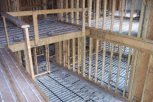 Photo of upper and ground floors with underfloor heating pipes