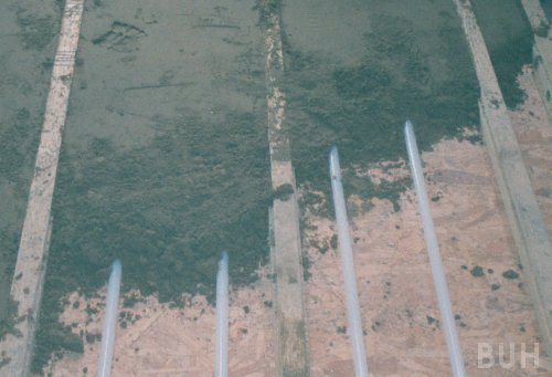 close-up photo of infill around underfloor heating pipes