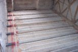 photo of underfloor heating installed between the joist of an existing floor