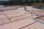 photo of underfloor heating in slab and screed floor